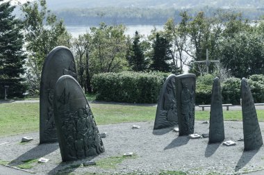 historic cast iron sculptures of Gaspe clipart