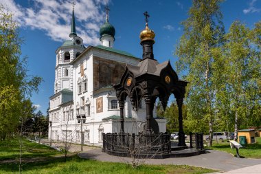 Russia, Irkutsk - May 27, 2021: Spasskaya Church of Chist the Saviour in the center of Irkutsk city is one of the oldest stone building in Irkutsk clipart