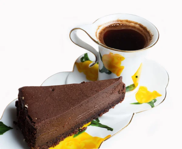 Sabroso un pastel de queso de chocolate con taza de café — Foto de Stock