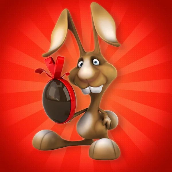 Fun rabbit with chocolate egg — Stock Photo, Image