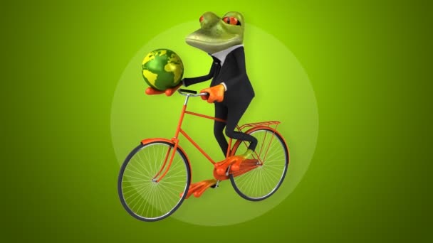 Fun cartoon frog on bicycle — Stock Video