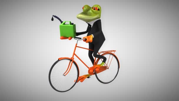 Fun cartoon frog on bicycle — Stock Video