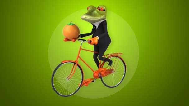 Divertida rana de dibujos animados en bicicleta — Vídeos de Stock