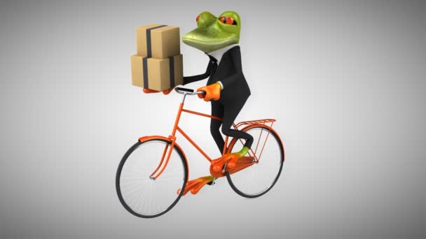 Весела мультяшна жаба на велосипеді — стокове відео