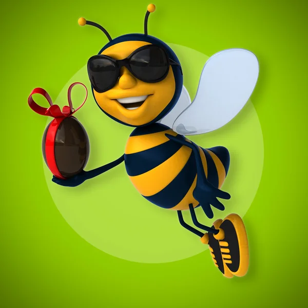 Bee holding Paasei — Stockfoto