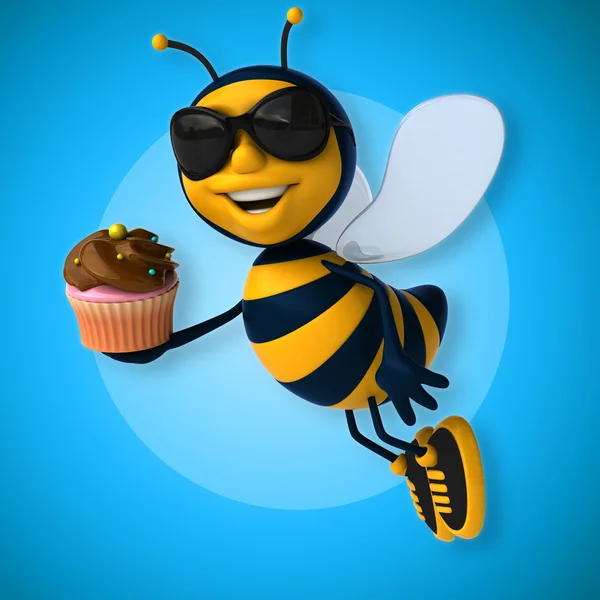 Μέλισσα εκμετάλλευση cupcake — Φωτογραφία Αρχείου