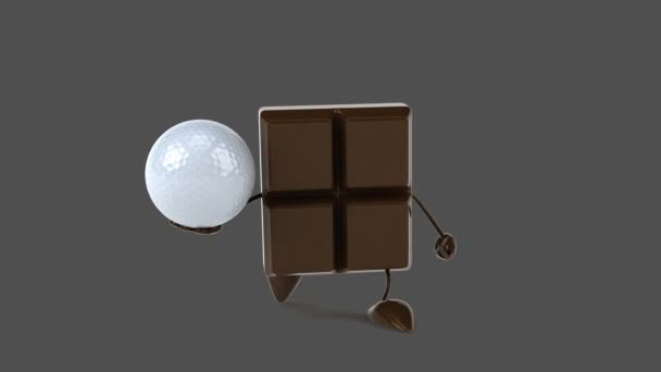 Barra de chocolate con pelota de golf — Vídeos de Stock