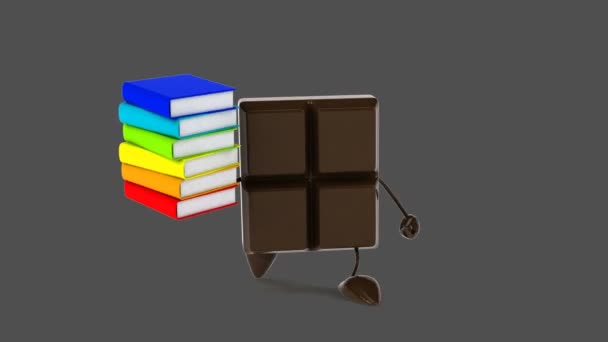 Chokladkaka med böcker — Stockvideo