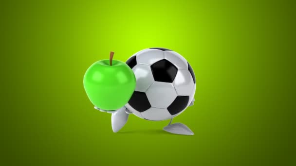 Pelota de fútbol con manzana verde — Vídeos de Stock