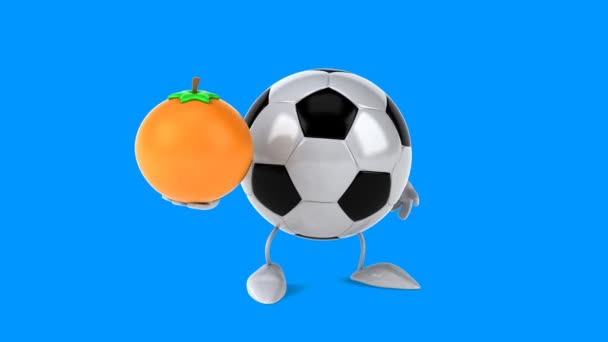 Football ball with an orange — Stock Video