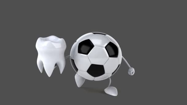 Football holding tooth — Stock Video