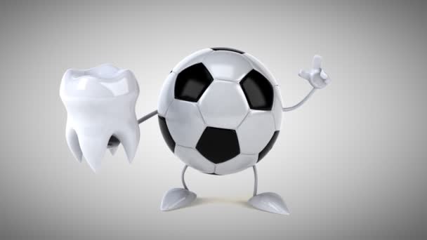 Calcio che tiene il dente — Video Stock