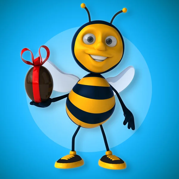 Bee holding ei — Stockfoto