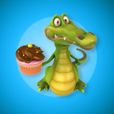 Timsah holding cupcake