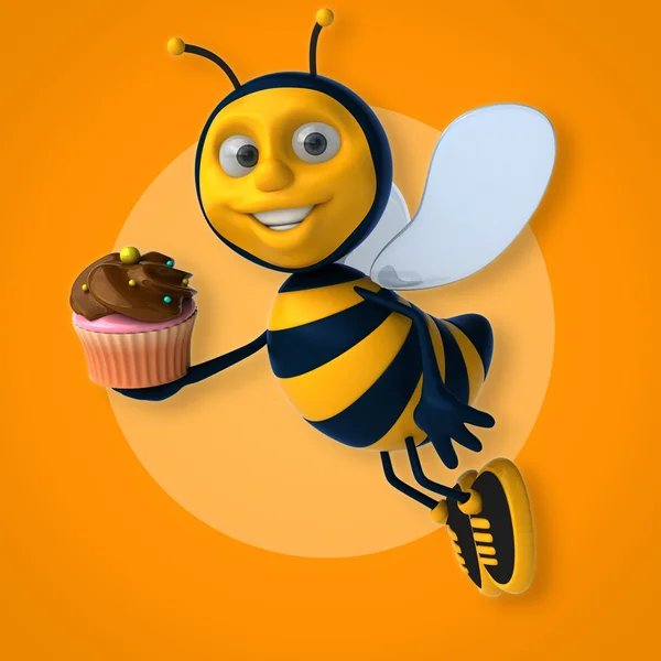 Bee holding cupcake — Stockfoto
