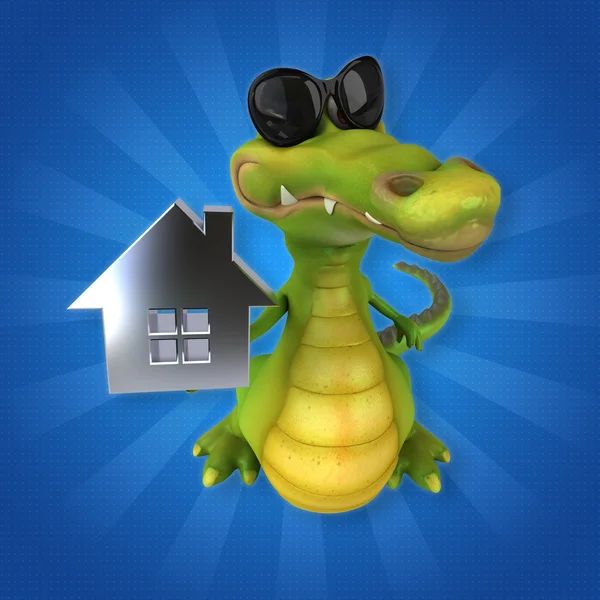 Crocodile holding paper house — Stock Photo, Image