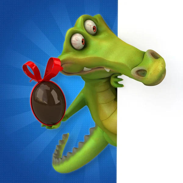 Карточка для крокодила и пасхальное яйцо — стоковое фото