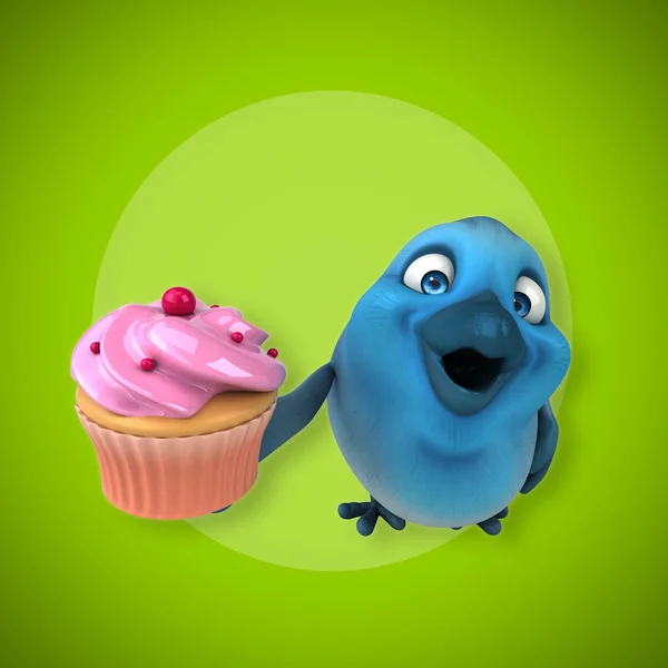 Vogel hält Cupcake — Stockfoto