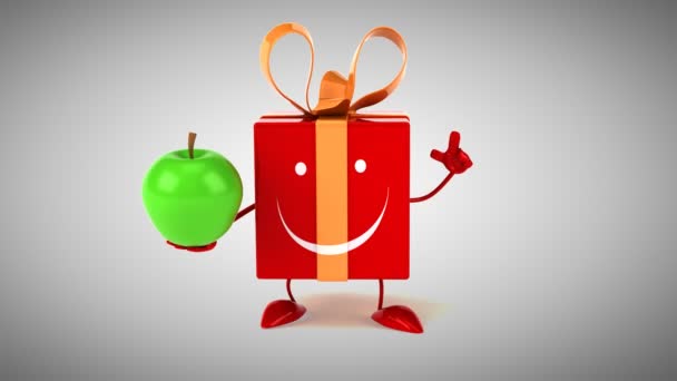 Regalo rojo con una manzana — Vídeos de Stock