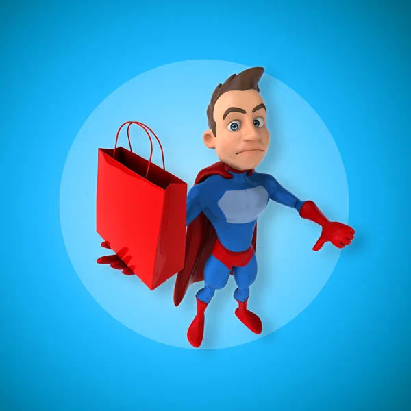 Superhero holding bag — Stock Photo, Image
