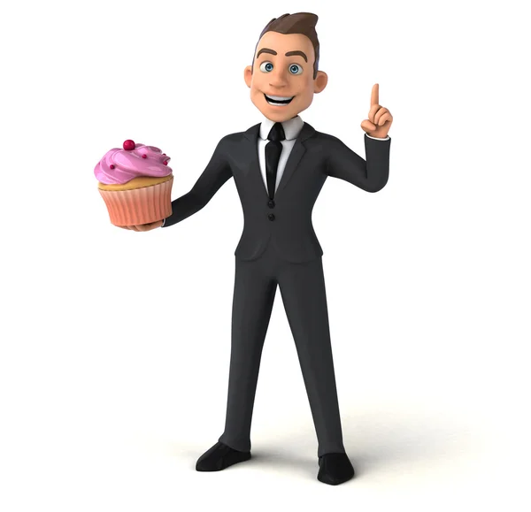 Biznesmen gospodarstwa cupcake — Zdjęcie stockowe