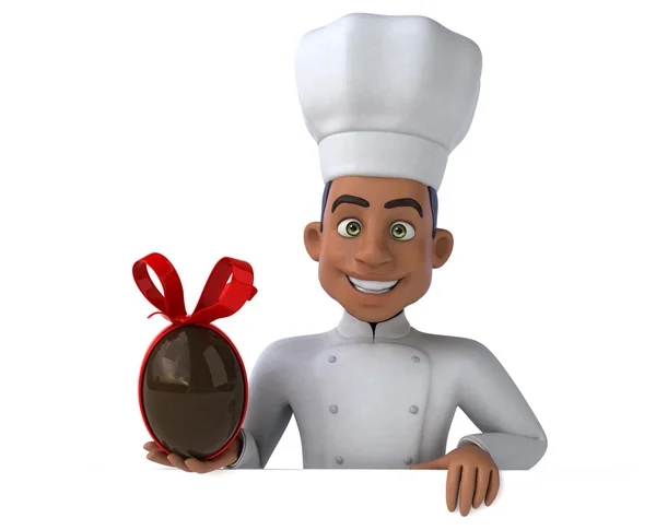 Koch hält Schokoladenei in der Hand — Stockfoto