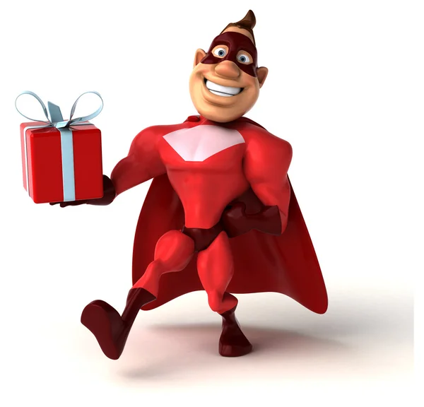 Superhero holding  gift — Stock Photo, Image