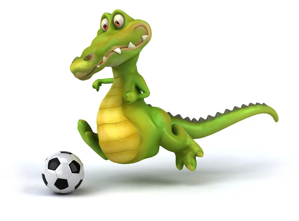 Sjov krokodille med fodbold - Stock-foto