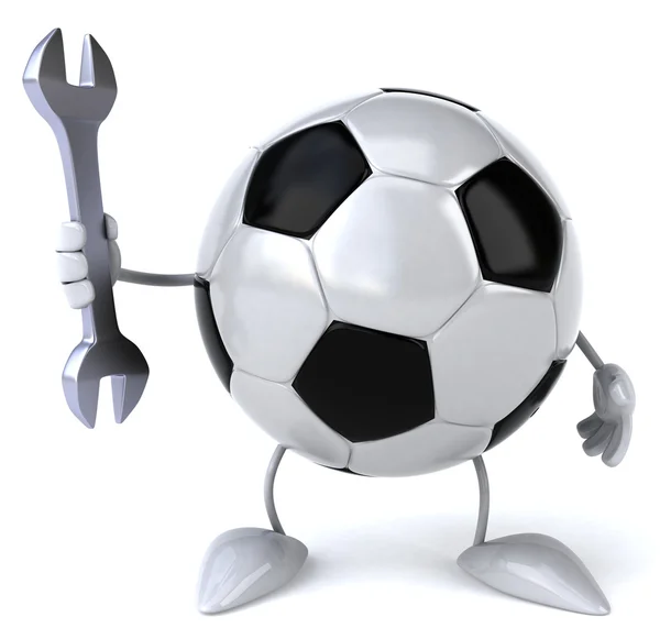 Pelota de fútbol con llave inglesa —  Fotos de Stock