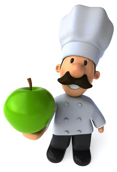 Zeichentrickkoch mit einem Apfel — Stockfoto