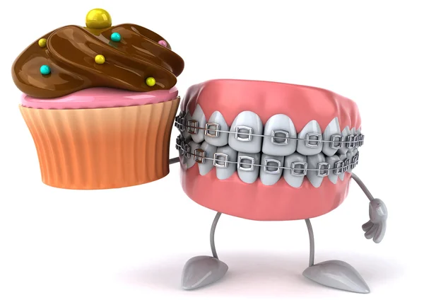 Веселые зубы с кексом — стоковое фото