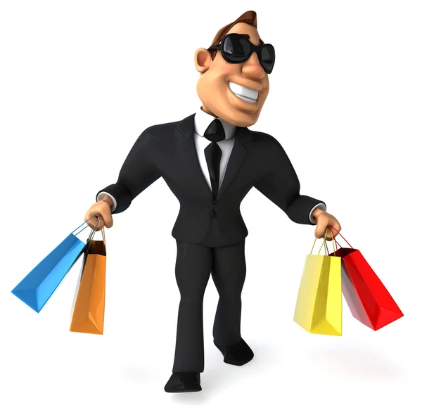 Businessman with shopping bags — Stock Photo, Image