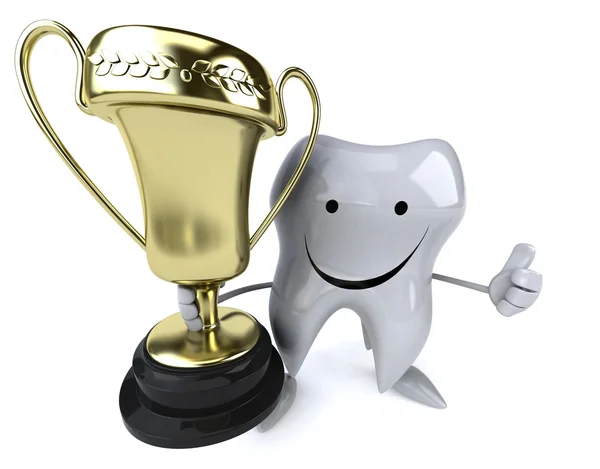 Веселый зуб с золотым трофеем — стоковое фото