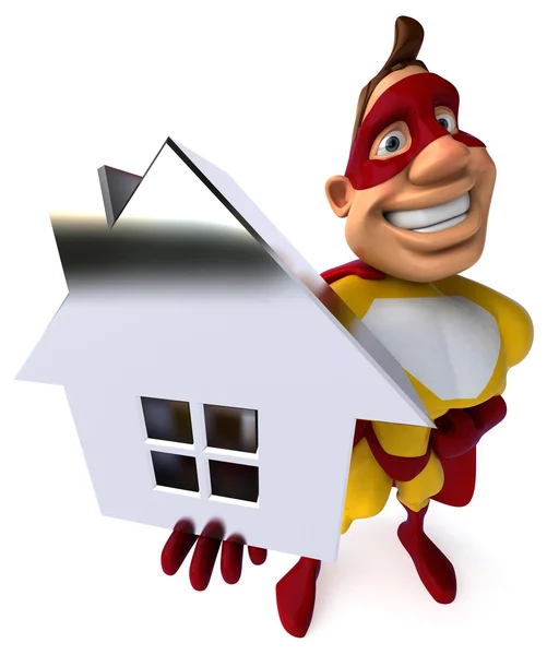 Fun superhero with model of the house — Stock Photo, Image