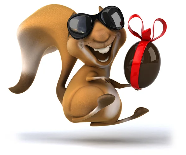 Esquilo divertido com um ovo de Páscoa de chocolate — Fotografia de Stock