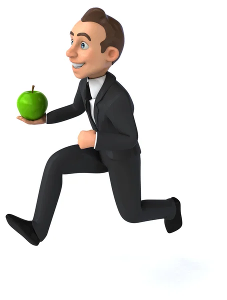 Веселый бизнесмен с зеленым яблоком — стоковое фото