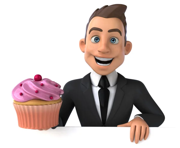 Fun businessman with cupcake — Stock Photo, Image