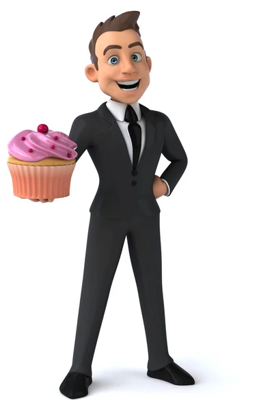 Fun businessman with cupcake — Stock Photo, Image