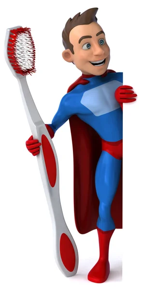 Веселый супергерой с зубной щеткой — стоковое фото