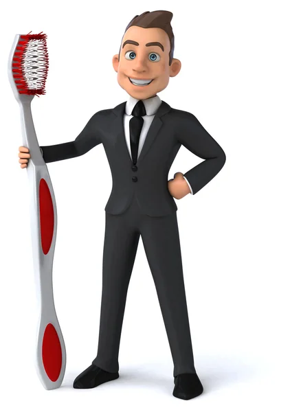 Fun businessman with toothbrush — Stock Photo, Image