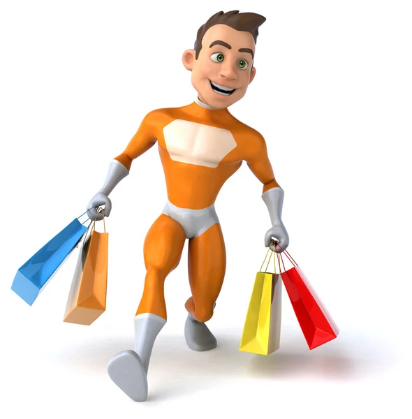 Superhero holding shopping bags — Stock Photo, Image