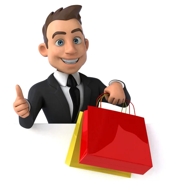 Fun businessman with shopping bags — Stock Photo, Image