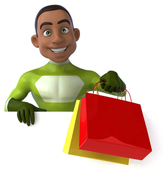 Fun superhero with shopping bags — Stock Photo, Image