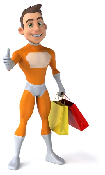 Fun superhero with shopping bags — Stock Photo, Image