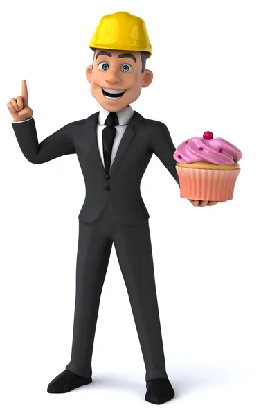 Fun architect with cupcake — Stock Photo, Image