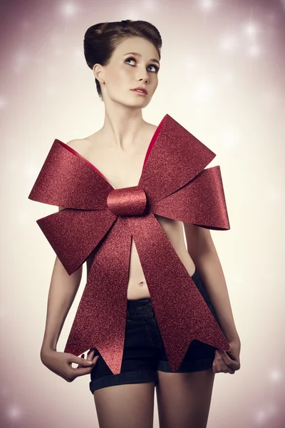 Woman adorned like a christmas gift — Stock Photo, Image