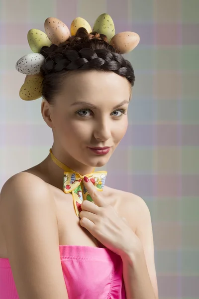 Nice easter girl with eggs on head — Stock Photo, Image
