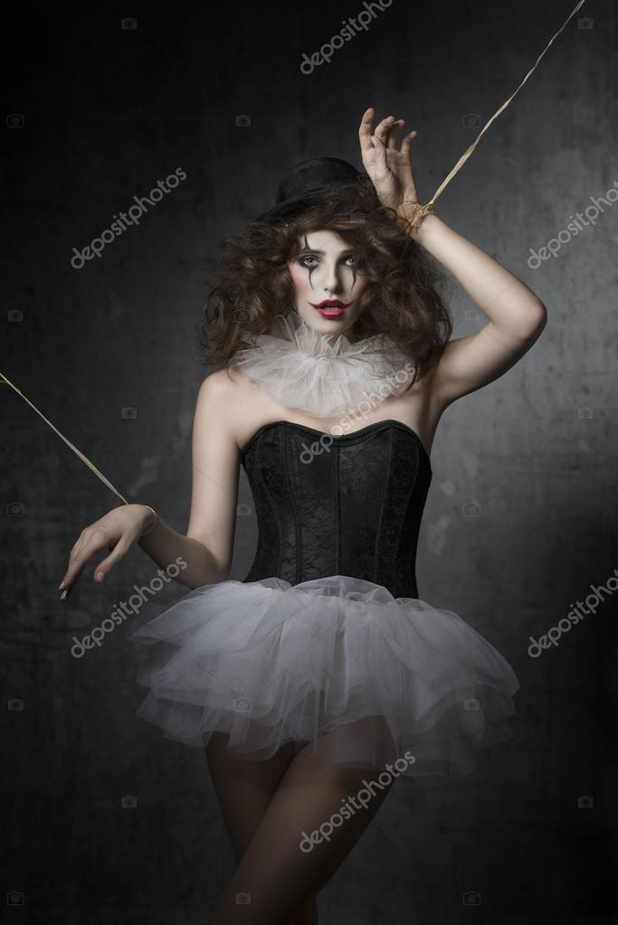 Wooden marionette in ballerina tutu