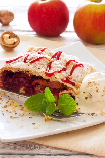 Christmas strudel with apples and cherries — Stock Photo, Image