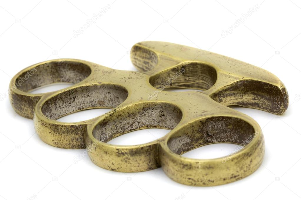 Brass knuckle-duster, weapon for hand, isolated on white backgro